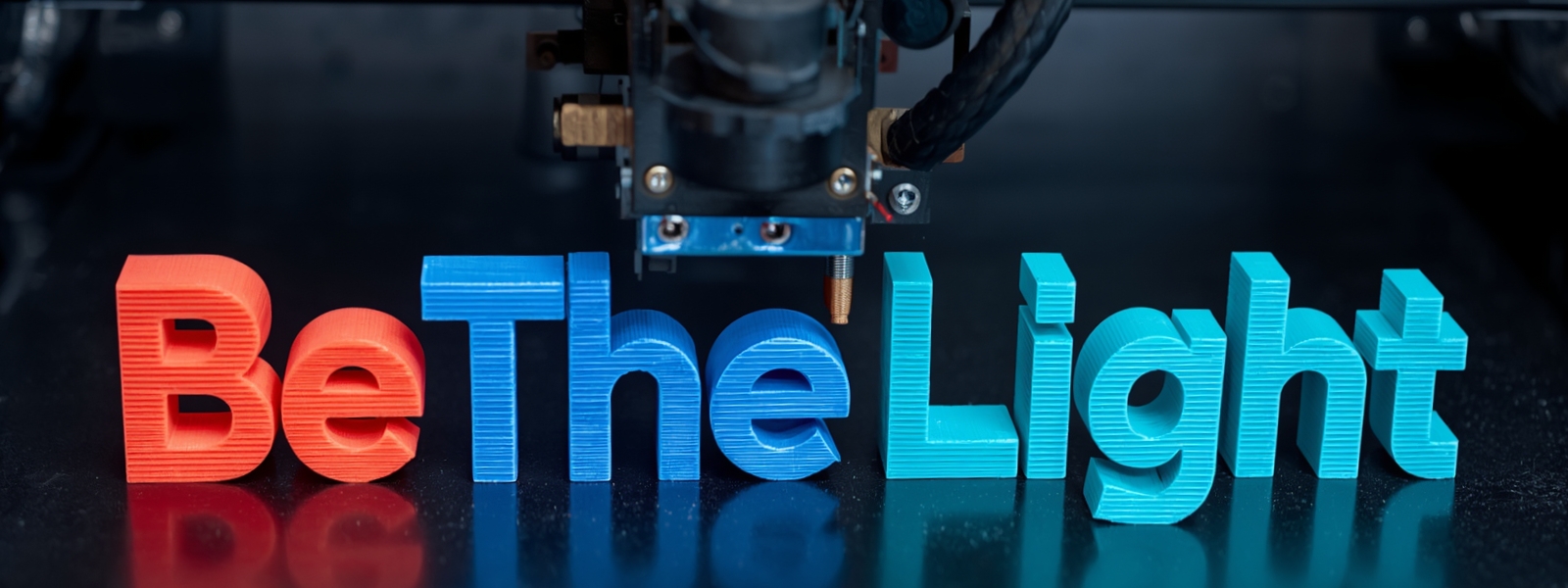 3d printer with the words be the light